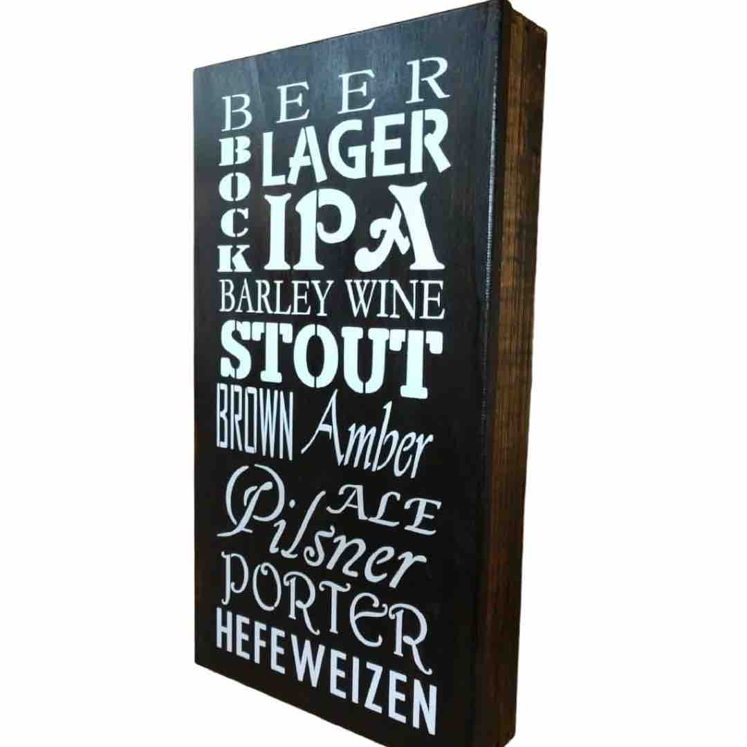 angled view of "Craft Beer" Concealed Storage Sign in distressed black