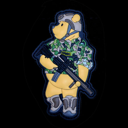 Winnie the Pew patch against a black background